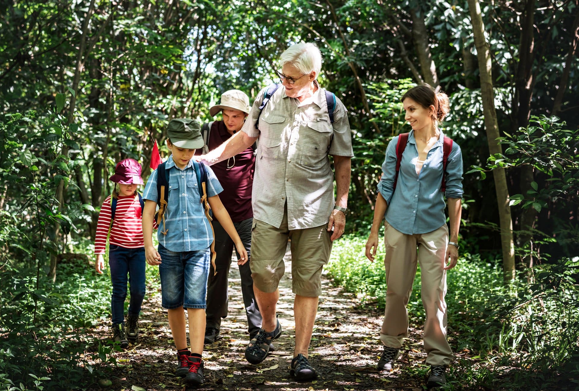 family hiking in a forest